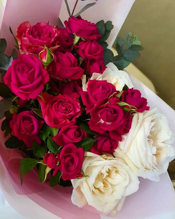 Professional floral arrangement in modern corporate setting